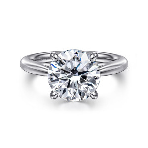 Gabriel & Co. ER16132R12W4JJJ 14 karat white gold Classic engagement ring, front view of a round center held by four rounded prong tips over a smooth band