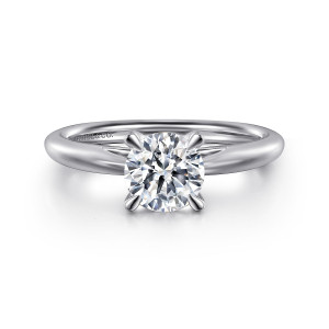 Gabriel & Co. ER16132R4PTJJJ platinum Classic engagement ring, front view of a round center held by four slim tapered prongs on a plain band