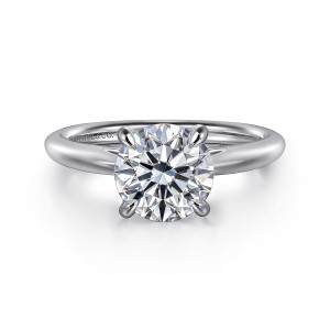 Gabriel & Co. ER16132R8W4JJJ 14 karat white gold Classic engagement ring, front view of a round center held by four rounded tip prongs on a smooth band