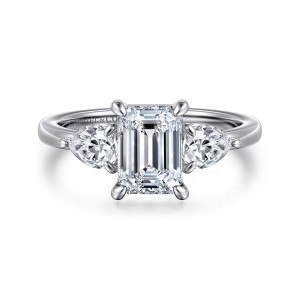 Gabriel & Co. ER16135E6W44JJ 14 karat white gold Contemporary engagement ring, front view of an emerald cut center between broad pear stones with tips aimed outward