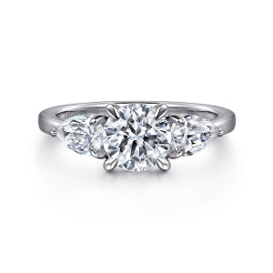 Gabriel & Co. ER16135R4W44JJ 14 karat white gold Contemporary engagement ring, front view of a round center flanked by large pear shaped stones with tips pointing outward