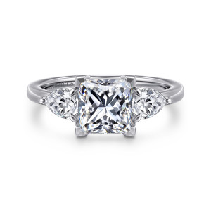 Gabriel & Co. ER16135S6W44JJ 14 karat white gold Contemporary engagement ring, front view of a princess cut center with square corner prongs beside two pear shaped stones