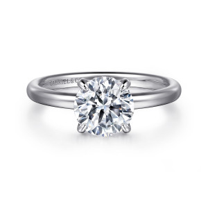 Gabriel & Co. ER16138R6W44JJ 14 karat white gold Classic engagement ring, front view of a round center in claw prongs on a smooth band with no halo showing
