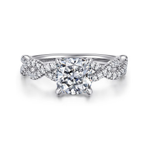 Gabriel & Co. ER16142C6W44JJ 14 karat white gold Contemporary engagement ring, front view of a cushion cut center flanked by crossing strands of small round diamonds