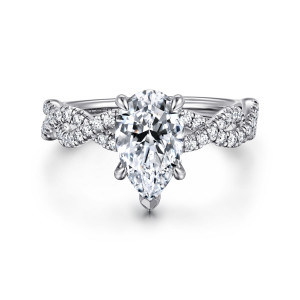 Gabriel & Co. ER16142P6W44JJ 14 karat white gold Contemporary engagement ring, front view of a pear shaped center with a V shaped tip prong and crossing stone rows