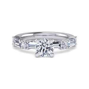 Gabriel & Co. ER16156R4W44JJ 14 karat white gold Contemporary engagement ring, front view of a round center flanked by baguettes and small round diamonds on a slim band