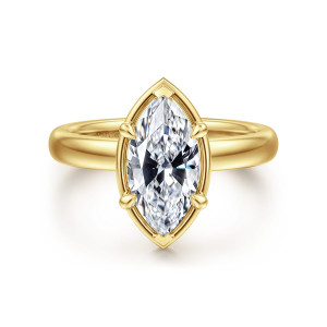 Gabriel & Co. ER16189M6Y44JJ 14 karat yellow gold Contemporary engagement ring, front view of a marquise center inside a smooth pointed frame with a cap at each tip
