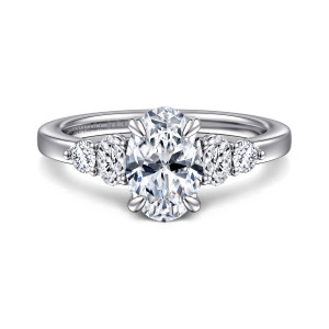 Gabriel & Co. ER16192O6W44JJ 14 karat white gold Classic engagement ring, front view of an oval center with an oval and a round stone stepping down each shoulder