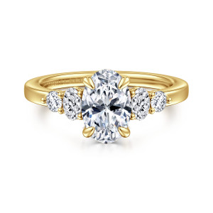 Gabriel & Co. ER16192O6Y44JJ 14 karat yellow gold Classic engagement ring, front view of an oval center with a smaller oval and a round stone stepping down each side