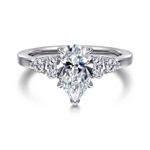 Gabriel & Co. ER16192P6W44JJ 14 karat white gold Classic engagement ring, front view of a pear shaped center with an elongated and a round stone on each side