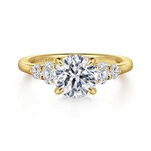 Gabriel & Co. ER16192R6Y44JJ 14 karat yellow gold Classic engagement ring, front view of the round center with larger and smaller stones stepping down each shoulder