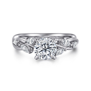 Gabriel & Co. ER16195R4W43JJ 14 karat white gold Floral Nouveau engagement ring, front view of a round center flanked by elongated diamonds set on crossing strands