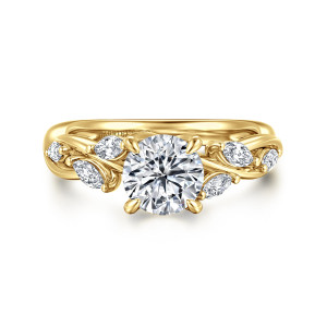 Gabriel & Co. ER16195R4Y43JJ 14 karat yellow gold Floral Nouveau engagement ring, front view of a round center, four claw prongs and elongated diamonds on twisting shoulders
