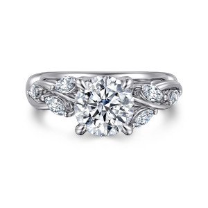 Gabriel & Co. ER16195R6W43JJ 14 karat white gold Floral Nouveau engagement ring, front view of a round center with elongated diamonds angled along the twisting shoulders
