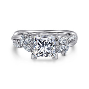 Gabriel & Co. ER16196S6W44JJ 14 karat white gold Floral Nouveau engagement ring, front view of a princess cut center between two petal like clusters of elongated diamonds