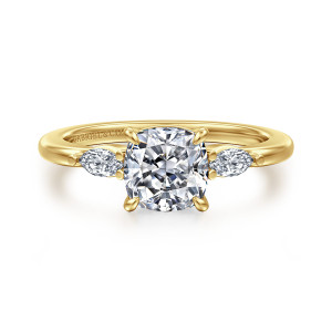 Gabriel & Co. ER16198C6Y43JJ 14 karat yellow gold Classic engagement ring, front view of a cushion center between two elongated side diamonds and bead tipped shoulders