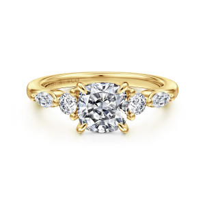Gabriel & Co. ER16199C6Y44JJ 14 karat yellow gold Contemporary engagement ring, front view of a cushion cut center flanked by a round and an elongated stone on each side