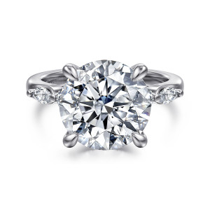 Gabriel & Co. ER16199R20W44JJ 14 karat white gold Contemporary engagement ring, front view of a round center in four claws with an elongated diamond on each side