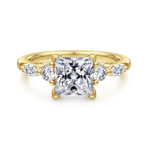 Gabriel & Co. ER16199S6Y44JJ 14 karat yellow gold Contemporary engagement ring, front view of a princess cut center with a round and an elongated diamond on each side