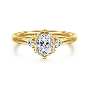 Gabriel & Co. ER16200G6Y44JJ 14 karat yellow gold Contemporary engagement ring, front view of the elongated center among drop tipped prongs with a diamond on each side