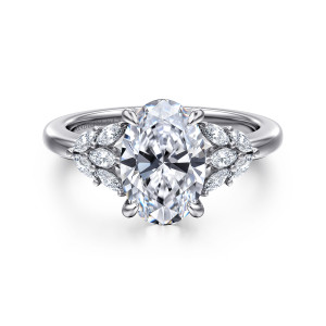 Gabriel & Co. ER16202O8W43JJ 14 karat white gold Floral Nouveau engagement ring, front view of an oval center with leaf shaped clusters of small elongated stones beside it