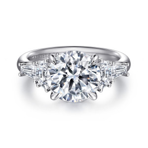 Gabriel & Co. ER16218R12W43JJ 14 karat white gold Classic engagement ring, front view of a round center with a half moon stone and a tapered baguette on each side
