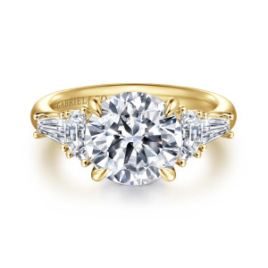 Gabriel & Co. ER16218R12Y43JJ 14 karat yellow gold Classic engagement ring, front view of a round center flanked by half moon and tapered baguette diamonds on each side