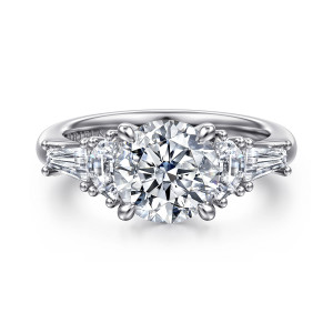Gabriel & Co. ER16218R8W43JJ 14 karat white gold Classic engagement ring, front view of a round center with a half moon and a tapered baguette stepping down each side