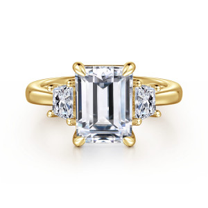 Gabriel & Co. ER16220E12Y43JJ 14 karat yellow gold Classic engagement ring, front view of the emerald cut center held at its corners by tapered prongs between two side stones
