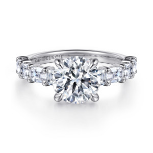 Gabriel & Co. ER16223R8W44JJ 14 karat white gold Contemporary engagement ring, front view of the round center flanked by rectangular step cut stones on both shoulders