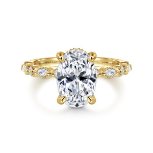 Gabriel & Co. ER16233O8Y44JJ 14 karat yellow gold Victorian engagement ring, front view of an oval center with elongated and round diamonds in beaded frames on both shoulders