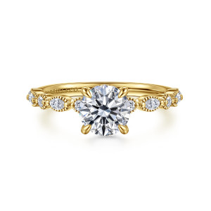 Gabriel & Co. ER16233R4Y44JJ 14 karat yellow gold Victorian engagement ring, front view of a round center on four prongs with beaded diamond frames along the band