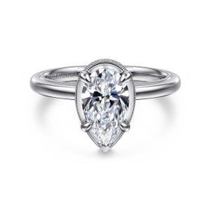 Gabriel & Co. ER16238P6W44JJ 14 karat white gold Classic engagement ring, front view of a pear shaped center held by claw prongs inside a beaded pointed rim