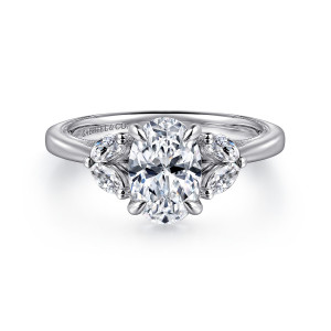 Gabriel & Co. ER16244O6W44JJ 14 karat white gold Contemporary engagement ring, front view of an oval center with a leaf shaped pair of elongated stones on each side