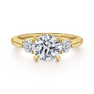 Gabriel & Co. ER16252R6Y44JJ 14 karat yellow gold Classic engagement ring, front view of a round center between two round side stones on ball tipped prongs
