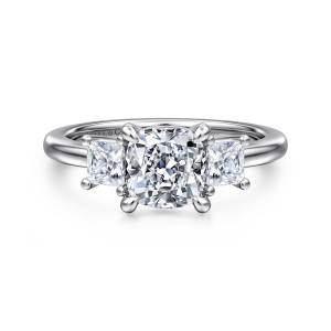 Gabriel & Co. ER16253C6W44JJ 14 karat white gold Classic engagement ring, front view of a cushion center with teardrop tipped prongs and a straight sided diamond each side