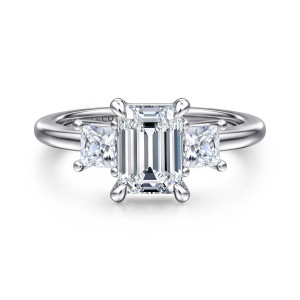 Gabriel & Co. ER16253E6W44JJ 14 karat white gold Classic engagement ring, front view of an emerald cut center flanked by square side stones held in small prongs