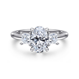 Gabriel & Co. ER16253O6W44JJ 14 karat white gold Classic engagement ring, front view of an oval center between square cornered side stones