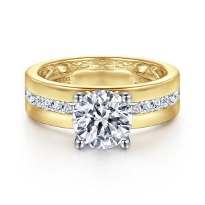 Gabriel & Co. ER16260R6M44JJ 14 karat white and yellow gold Contemporary engagement ring, front view of a round center on four ball tipped prongs above a channel of square stones