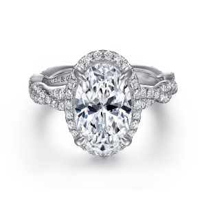 Gabriel & Co. ER16273O12W44JJ 14 karat white gold Contemporary engagement ring, front view of an oval center inside a fine halo, with twisted diamond strands on both sides