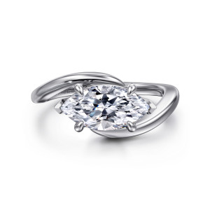 Gabriel & Co. ER16277M6W4JJJ 14 karat white gold Contemporary engagement ring, front view of a sideways marquise center with pointed end tips inside a sweeping bypass band