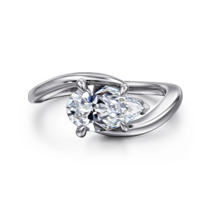 Gabriel & Co. ER16277P6W4JJJ 14 karat white gold Contemporary engagement ring, front view of a pear shaped center lying sideways between two sweeping band ends