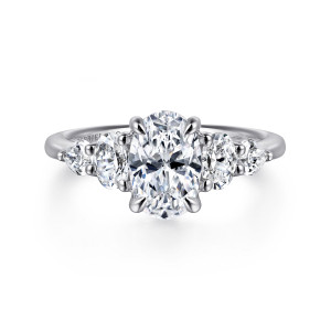 Gabriel & Co. ER16279O6W44JJ 14 karat white gold Contemporary engagement ring, front view of an oval center flanked by oval and pear shaped side stones