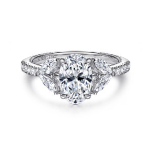 Gabriel & Co. ER16281O6W44JJ 14 karat white gold Contemporary engagement ring, front view of an oval center with four slim prongs and paired elongated stones on each side