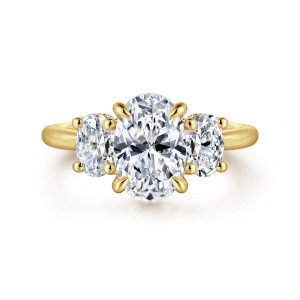 Gabriel & Co. ER16285O6Y44JJ 14 karat yellow gold Classic engagement ring, front view of an oval center with rounded prongs between two slightly smaller oval side stones