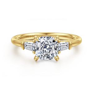 Gabriel & Co. ER16288C6Y44JJ 14 karat yellow gold Classic engagement ring, front view of a cushion cut center between tapered step cut stones with a beaded band edge
