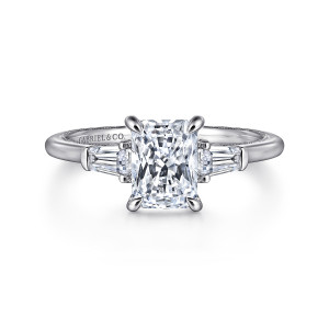 Gabriel & Co. ER16288N6W44JJ 14 karat white gold Classic engagement ring, front view of the rectangular seat with rounded prong tips and a tapered baguette on each side