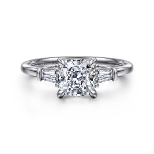 Gabriel & Co. ER16289C6W43JJ 14 karat white gold Classic engagement ring, front view of a cushion cut center with a baguette stone and metal tab on each side