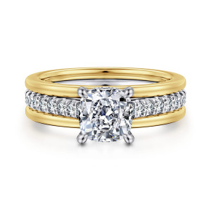 Gabriel & Co. ER16303C6M44JJ 14 karat white and yellow gold Contemporary engagement ring, front view of a cushion center above a wide band with a strip of round stones between rails