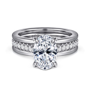 Gabriel & Co. ER16303O8W44JJ 14 karat white gold Contemporary engagement ring, front view of an oval center in claw prongs above a diamond row framed by smooth rails